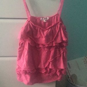 A pink ruffle top
